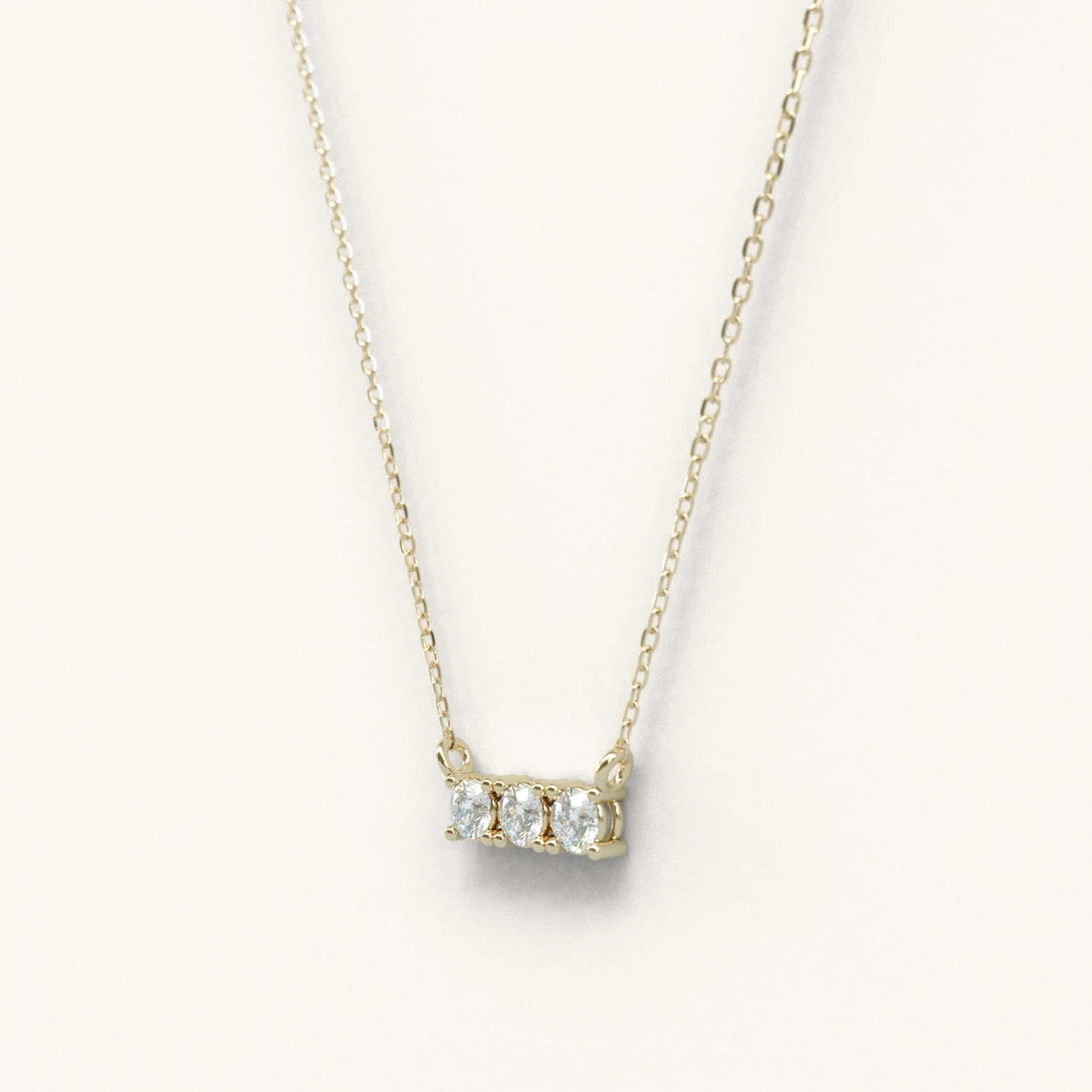 14K Gold Trio Diamond Necklace 0.18 Ctw